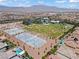 Aerial view of the community park featuring sports fields, tennis courts and a splash pad at 10416 Skye Arroyo Ave, Las Vegas, NV 89166