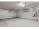 Spacious two-car garage with ample storage shelving, ready for your vehicles and gear at 10416 Skye Arroyo Ave, Las Vegas, NV 89166