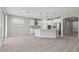 Open concept kitchen features an island, stainless steel appliances, and lots of cabinet space at 10416 Skye Arroyo Ave, Las Vegas, NV 89166