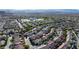 Expansive aerial view showcasing a meticulously planned residential community nestled amidst scenic mountain landscapes at 11082 Sospel Pl, Las Vegas, NV 89141