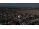 High-angle view of a well-established community, displaying its layout and proximity to the surrounding desert landscape at 11082 Sospel Pl, Las Vegas, NV 89141