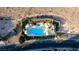 Community pool and recreation area with ample lounging space and desert landscaping at 11082 Sospel Pl, Las Vegas, NV 89141