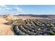 Expansive neighborhood with desert landscape, showcasing distant mountain views at 11082 Sospel Pl, Las Vegas, NV 89141