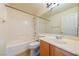 Bathroom featuring a bathtub, shower, and vanity at 11082 Sospel Pl, Las Vegas, NV 89141