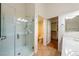 Bathroom with a glass-enclosed shower, and separate toilet and closet areas at 11082 Sospel Pl, Las Vegas, NV 89141