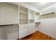 Walk-in closet with built-in shelving and drawers at 11082 Sospel Pl, Las Vegas, NV 89141