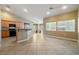 Open-concept living area connecting to the kitchen with natural lighting at 11082 Sospel Pl, Las Vegas, NV 89141