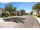 Beautiful neighborhood street with well-kept homes and mature trees at 11082 Sospel Pl, Las Vegas, NV 89141
