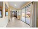 Spacious sun room with large glass sliding doors leading to a covered patio area and access to the main house at 11082 Sospel Pl, Las Vegas, NV 89141