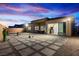 Backyard featuring a landscaped patio with elegant outdoor seating at 11672 Barga Ct, Las Vegas, NV 89138