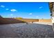 This backyard is fully fenced, beautifully landscaped, and finished with paver stones at 11672 Barga Ct, Las Vegas, NV 89138