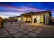 This backyard is stunning at sunset with tasteful landscaping at 11672 Barga Ct, Las Vegas, NV 89138