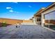 Paver stones and low maintenance landscaping make this backyard oasis relaxing and calming at 11672 Barga Ct, Las Vegas, NV 89138
