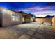 The backyard has unique pavers and desert landscaping at 11672 Barga Ct, Las Vegas, NV 89138