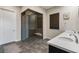 Modern bathroom featuring a glass-enclosed shower, double vanity, and stylish finishes at 11672 Barga Ct, Las Vegas, NV 89138