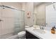 This bathroom has a glass shower door and a sleek design at 11672 Barga Ct, Las Vegas, NV 89138