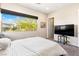 Bright bedroom with a neutral color palette and plush carpeting at 11672 Barga Ct, Las Vegas, NV 89138