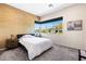 This bedroom has a stunning design and a view of the outdoors at 11672 Barga Ct, Las Vegas, NV 89138