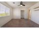 Bright bedroom with carpet, ceiling fan, a large window and closet at 1220 Padre Serra Ln, Las Vegas, NV 89134