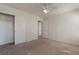 Bedroom featuring neutral carpet and closet with sliding doors at 1220 Padre Serra Ln, Las Vegas, NV 89134