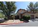 Charming two-story home with a tile roof and an attached garage in a well-maintained neighborhood at 1220 Padre Serra Ln, Las Vegas, NV 89134