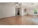 Open living area with hardwood floors, access to the kitchen, and ample space for entertaining at 1220 Padre Serra Ln, Las Vegas, NV 89134