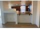 A partial view of the kitchen and adjacent breakfast bar area at 15 E Agate Ave # 202, Las Vegas, NV 89123
