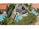 Aerial view of a home showcasing the pool, solar panels, mature landscaping, and backyard at 15 Pheasant Ridge Dr, Henderson, NV 89014