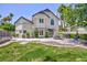 Charming backyard featuring a well-maintained lawn, patio area, and lush landscaping at 15 Pheasant Ridge Dr, Henderson, NV 89014