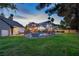 Expansive backyard featuring a private pool and manicured lawn, perfect for outdoor activities at 15 Pheasant Ridge Dr, Henderson, NV 89014