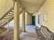 Exterior entryway with bench seating and view of stairs at 1509 Linnbaker Ln # 102, Las Vegas, NV 89110
