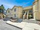 Two-story apartment building with stairs leading to the units and a well-maintained exterior at 1509 Linnbaker Ln # 102, Las Vegas, NV 89110