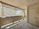 Private patio space with concrete flooring and partial sun shade at 1509 Linnbaker Ln # 102, Las Vegas, NV 89110