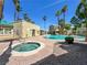Community pool area showcasing a hot tub, sun deck, and lounge area at 1509 Linnbaker Ln # 102, Las Vegas, NV 89110