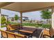 Outdoor community space featuring shaded seating areas and well-maintained landscaping at 1596 Pacific Baza St, Las Vegas, NV 89138