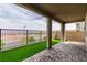 Spacious covered patio with artificial turf and beautiful views at 1596 Pacific Baza St, Las Vegas, NV 89138