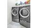 Laundry room featuring modern front load washer and dryer at 1596 Pacific Baza St, Las Vegas, NV 89138