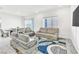 Bright living room featuring modern furnishings and plenty of natural light at 1596 Pacific Baza St, Las Vegas, NV 89138