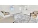 Cozy loft featuring comfortable seating and plenty of natural light at 1596 Pacific Baza St, Las Vegas, NV 89138