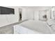 Spacious bedroom featuring a walk-in closet, sitting area, and neutral color palette at 1596 Pacific Baza St, Las Vegas, NV 89138