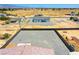 Aerial shot featuring backyard and rooftop detailing a new home under construction within a spacious lot at 1801 S Manzanita Dr, Pahrump, NV 89048