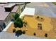 Aerial view showcasing the home's desert landscaping, driveway, and backyard at 1801 S Manzanita Dr, Pahrump, NV 89048
