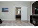 Modern bathroom featuring sliding barn door, sleek vanity, and contemporary design elements at 1801 S Manzanita Dr, Pahrump, NV 89048