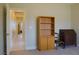 Bedroom featuring an armoire and an adjoining hall at 1801 S Manzanita Dr, Pahrump, NV 89048