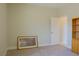 Bedroom featuring a door and a framed picture at 1801 S Manzanita Dr, Pahrump, NV 89048