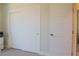 Bedroom showcasing a large closet and an interior door at 1801 S Manzanita Dr, Pahrump, NV 89048