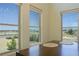 Bright dining area featuring large windows with beautiful views of the surrounding landscape at 1801 S Manzanita Dr, Pahrump, NV 89048