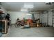 Spacious two-car garage with ample storage space and room for organization; fluorescent lighting at 1801 S Manzanita Dr, Pahrump, NV 89048
