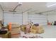 Garage interior with closed doors and boxes at 1801 S Manzanita Dr, Pahrump, NV 89048