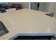 Kitchen countertop with stainless steel sink with open floor plan in the background at 1801 S Manzanita Dr, Pahrump, NV 89048